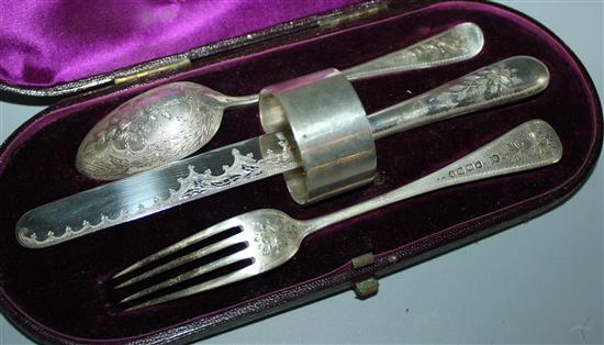 Victorian childs silver knife, fork, spoon and serviette set, cased